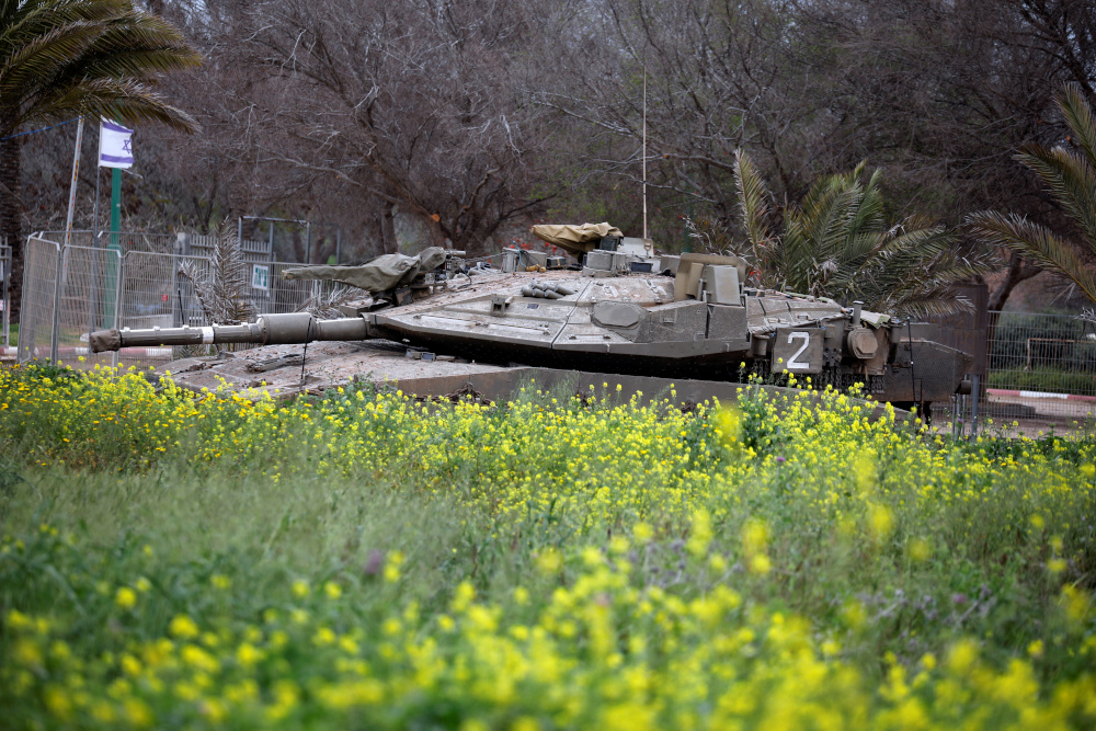 An Israeli tank is seen in a field near the border between Israel and Gaza on its Israeli side, March 15, 2019. u00e2u20acu201d Reuters pic  